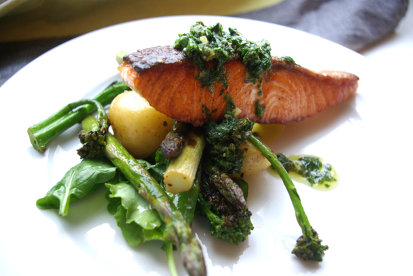 Salmon fillet with salsa verde on a new potato and asparagus salad - recipe.