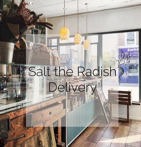 Salt the Radish's café counter with the following text over it: "Salt the Radish Delivery".