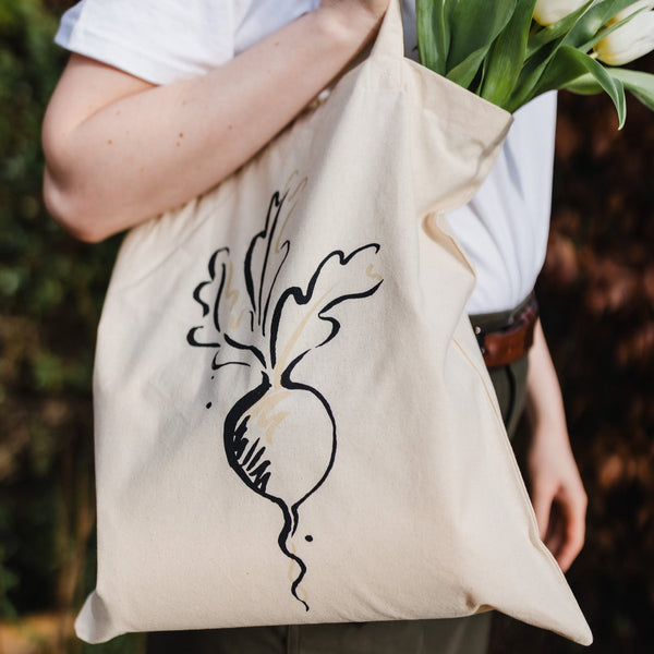 Radish tote bag being carried over shoulder.